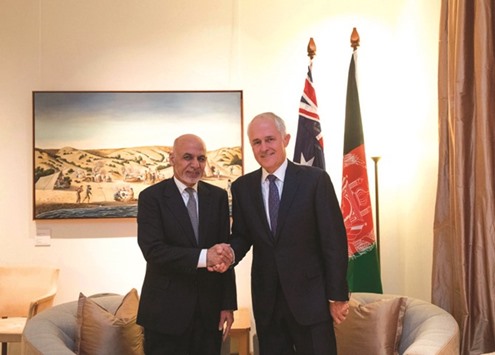 This handout from the Australian Prime Ministeru2019s Office taken and released yesterday shows Prime Minister Malcolm Turnbull shaking hand with the visiting President of Afghanistan Mohamed Ashraf Ghani in Canberra. Ghani is touring Australia on a four-day visit.