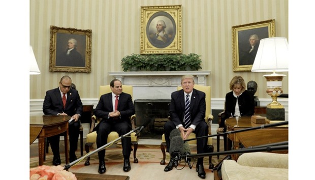 US President Donald Trump speaks during his meeting with Egyptian President Abdel Fattah al-Sisi in the Oval Office of the White House in Washington, yesterday.