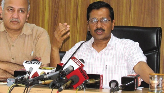 Delhi Chief Minister Arvind Kejriwal and Deputy Chief Minister Manish Sisodia address a press conference in New Delhi yesterday.