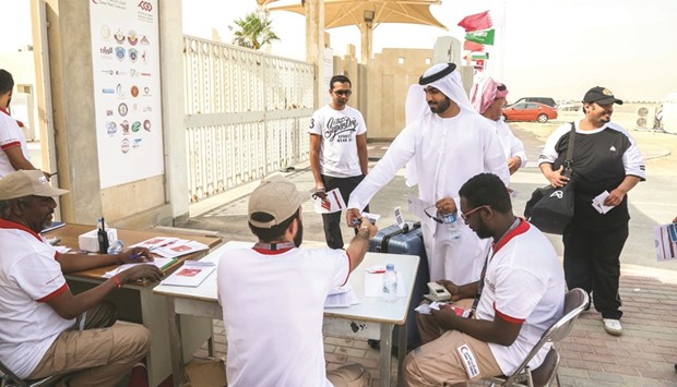 Volunteers assisting participants at the camp.