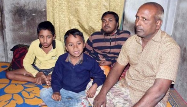 Tofazzal Hossain with his sons and grandson