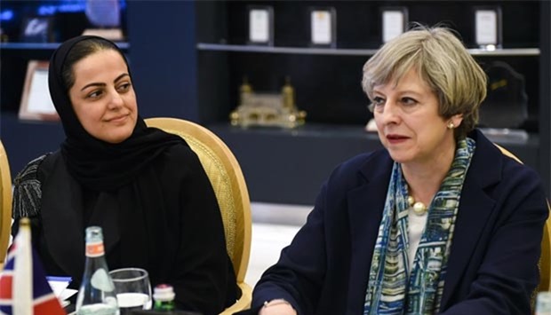 British Prime Minister Theresa May attends a meeting with Sarah al-Suhaimi, CEO of the Saudi Stock Exchange (Tadawul) at the exchange in Riyadh on Tuesday.
