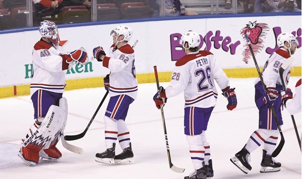 Montreal Canadiens goalie Charlie Lindgren (No 40) celebrates with left wing Artturi Lehkonen (No 62) after defeating the Florida Panthers 4-1 at BB&T Centre. PICTURE: USA TODAY Sports