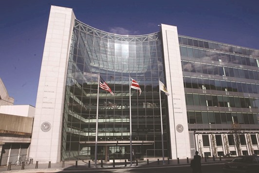 The Securities and Exchange Commission headquarters is seen in Washington, DC. The New York Stock Exchange, Chicago Stock Exchange and Nasdaq are all awaiting decisions by the SEC on whether they can delay trades through so-called u201cspeed bumpsu201d and new order types.