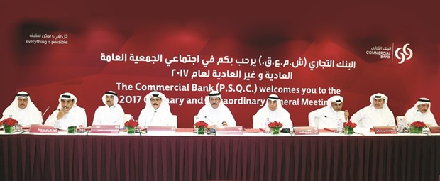 Sheikh Abdulla and Alfardan among other directors at the Commercial Banku2019s ordinary and extraordinary general meeting at the Commercial Bank Plaza yesterday. PICTURE: Jayan Orma