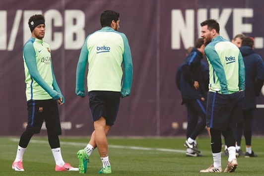 Barcelona superstar Lionel Messi Messi (right) is back after missing his last two games for club and country through suspension. (AFP)