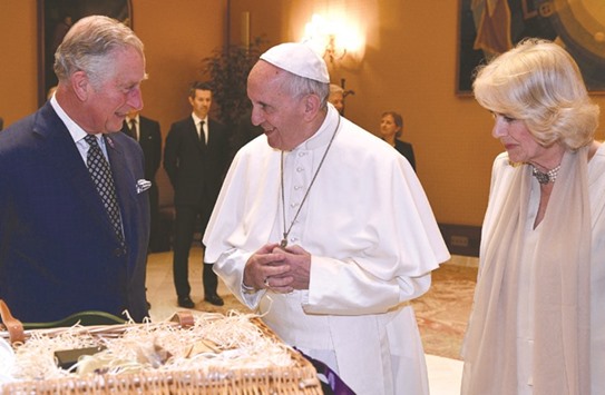 Pope Francis meets with Prince Charles, Prince of Wales and his wife Camilla, Duchess of Cornwall, during a private audience at the Vatican yesterday.