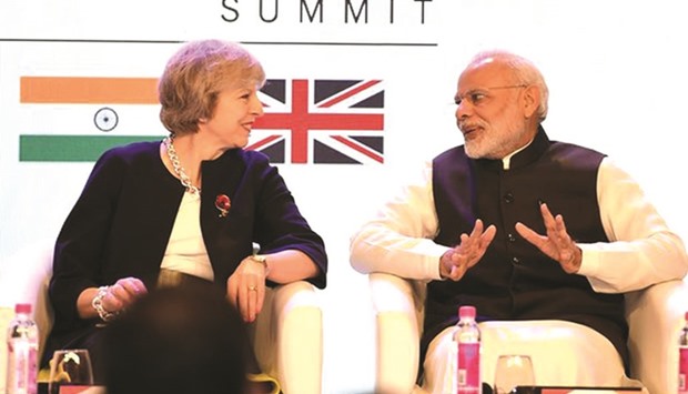 Theresa May with Indiau2019s Prime Minister Narendra Modi at the India-UK Tech Summit in New Delhi last November.