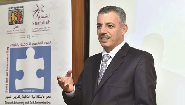 A speaker enlightening the gathering about autism at the event.