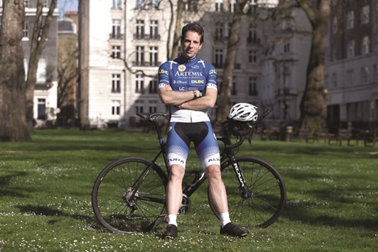 Endurance cyclist Mark Beaumont, who is aiming for a record-breaking circumnavigation of the globe in 80 days in July, poses during a photocall in central London.