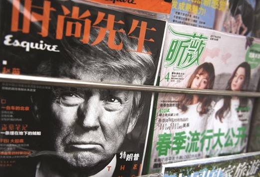 A magazine featuring a front page photo of US President Donald Trump is seen at a news stand in Beijing.  The first summit between US President Donald Trump and his Chinese counterpart Xi Jinping will be of u201cgreat significanceu201d for global peace, the two countriesu2019 top diplomats agreed ahead of the meeting.