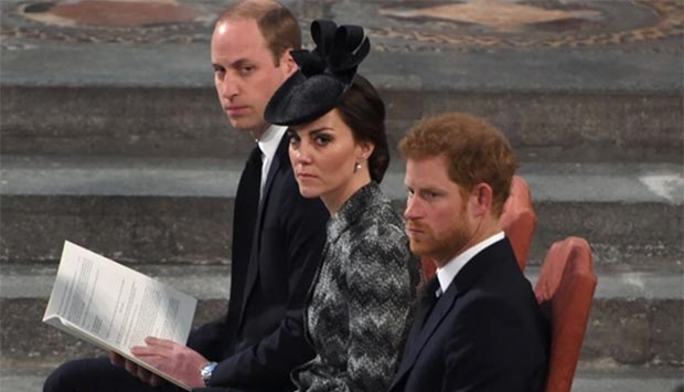 Prince William, Duke of Cambridge, Catherine, Duchess of Cambridge, and Prince Harry attend a Service of Remembrance at Westminster Abbey in London on Wednesday.