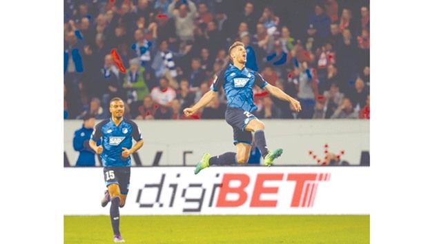 Hoffenheimu2019s Andrej Kramaric (R) reacts after scoring goal against Bayern Munich. (Reuters)