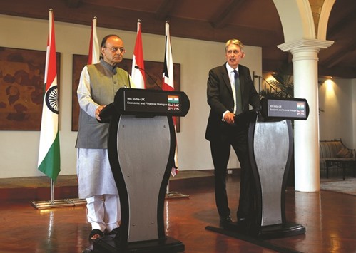 Britainu2019s Chancellor of the Exchequer Philip Hammond (right) speaks during a joint news conference with Indiau2019s Finance Minister Arun Jaitley in New Delhi on Tuesday. The UK has no plans to scale back its ambitions to complete a post-Brexit free trade deal with New Delhi, despite Indiau2019s habit of dragging out negotiations, Hammond said.