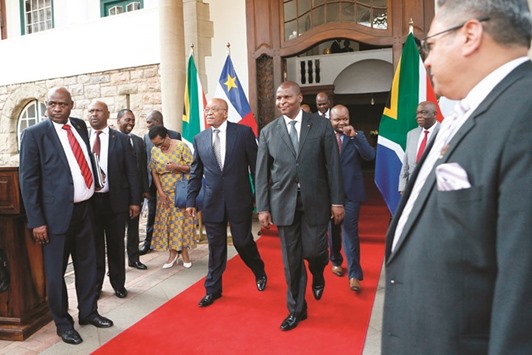 South African President Jacob Zuma (left) walks with Central African Republic President Professor Faustin-Archange Touadera at the Sefako M Makgatho Presidential Guesthouse in Pretoria yesterday.