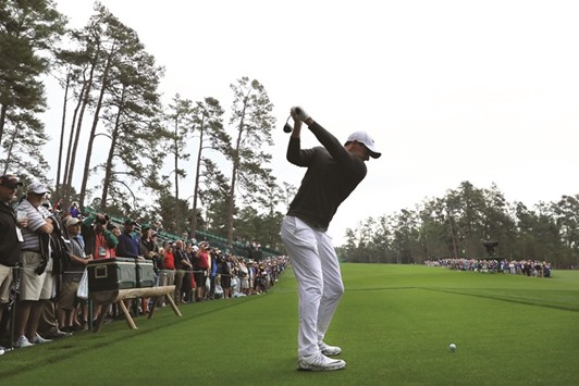 Rory McIlroy of Northern Ireland plays his shot from the 14th tee during a practice round prior to the start of the 2017 Masters Tournament at Augusta National Golf Club in Augusta, Georgia, yesterday. (AFP)
