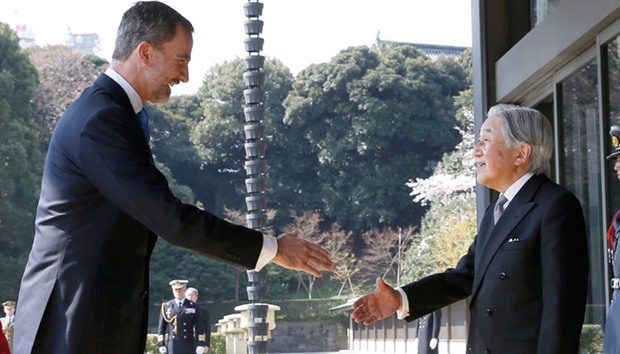 Spainu2019s King Felipe (left) shakes hands with Japanu2019s Emperor Akihito upon his arrival for a welcoming ceremony at the Imperial Palace in Tokyo. The Spanish royal couple is on a four-day state visit to Japan.