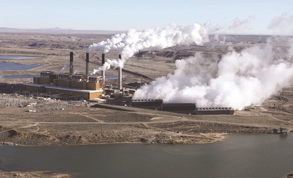 Steam rises from the coal-fired Jim Bridger power plant outside Rock Springs, Wyoming.