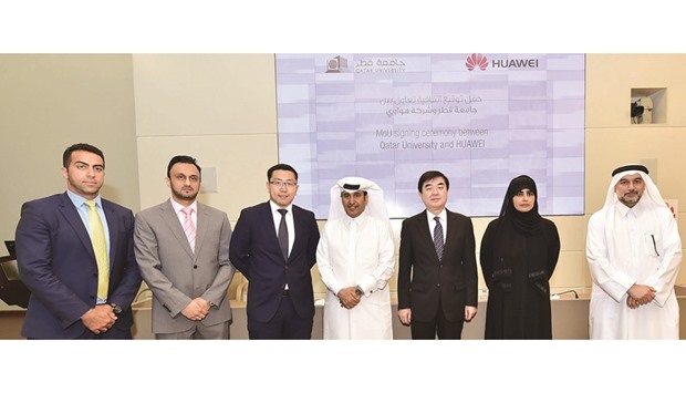 QU, Huawei officials with Chinese ambassador Li Chen at the MoU signing ceremony yesterday.