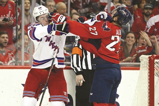 New York Rangers left wing Jimmy Vesey (R) and Washington Capitals defenseman Karl Alzner exchange punches in the second period at Verizon Centre. PICTURE: USA TODAY Sports