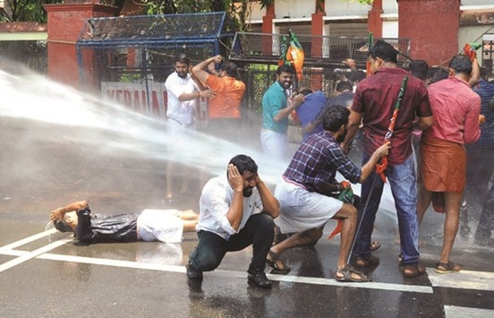 Water cannons used by police to disperse BJP protesters in Kochi.