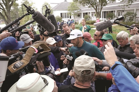 Dustin Johnson of the United States talks to the media announcing his withdrawal during the first round of the 2017 Masters Tournament at Augusta National Golf Club in Augusta, Georgia, yesterday. (Getty Images/AFP)