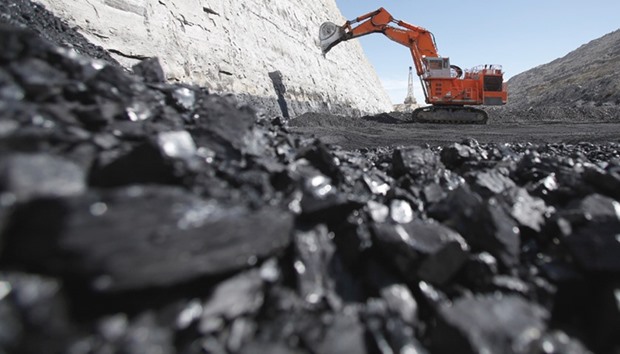 This 2014 photograph shows coal being excavated at the Jim Bridger Mine, owned by energy firm PacifiCorp and the Idaho Power Company, outside Point of the Rocks, Wyoming.