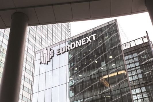 The Euronext logo is seen on the exterior of the Paris Stock Exchange. The CAC 40 climbed 0.6% at 5,121.44 points yesterday.