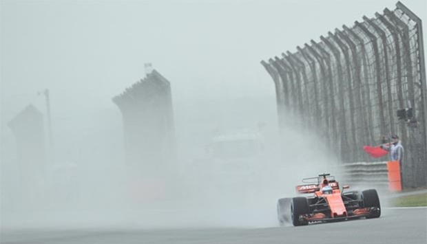McLaren's Spanish driver Fernando Alonso drives during the first practice session of the Formula One Chinese Grand Prix in Shanghai on Friday.