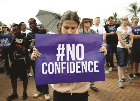 Demonstrators take part in a protest in Durban yesterday calling for the removal of President Zuma.