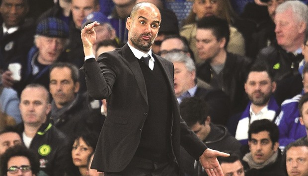 File picture of Manchester Cityu2019s Spanish manager Pep Guardiola shouting instructions to his players from the touchline.