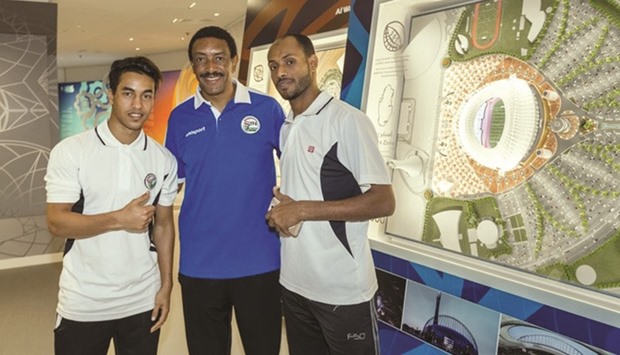 Yemen coach Abraham Mebratu (C) with his players during a visit to the Supreme Committeeu2019s offices.