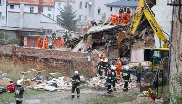 Rescuers search after a building collapsed burying several people in Swiebodzice