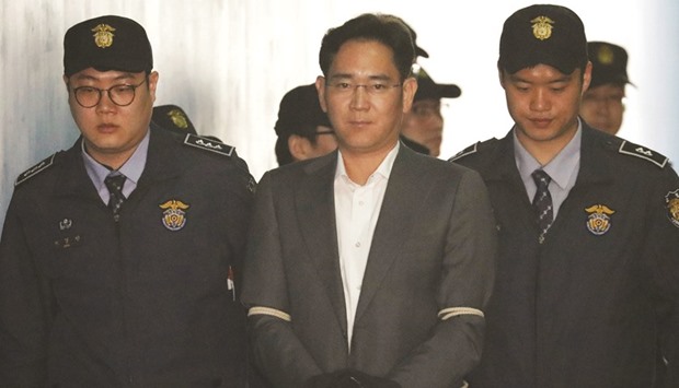 Samsung Group chief Jay Y Lee arrives at a court in Seoul. The billionaire heir to the Samsung group is fending off accusations of corruption just as its largest firm is  trying to regain ground lost to Apple during 2016u2019s Note 7 recall debacle.