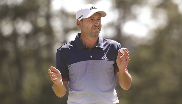 Sergio Garcia of Spain reacts after putting out on the 18th hole during the second round of the 2017 Masters.