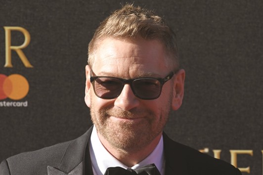 Northern Irish actor Kenneth Brannagh poses on the red carpet upon arrival to attend the 2017 Laurence Olivier Awards in London yesterday.