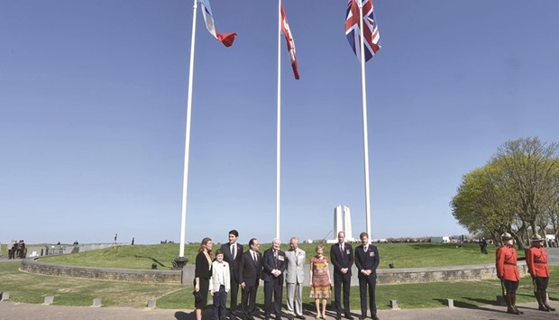 Hollande, Trudeau, Trudeauu2019s wife Sophie Gregoire (second left) and son Xavier, Britainu2019s Prince Charles, Governor General of Canada David Johnston (centre), Johnstonu2019s wife Sharon, and Britainu2019s Princes William and Harry pose at a commemoration ceremony to mark the 100th anniversary of the Battle of Vimy Ridge at the Canadian National Vimy Memorial in Vimy, near Arras, northern France.
