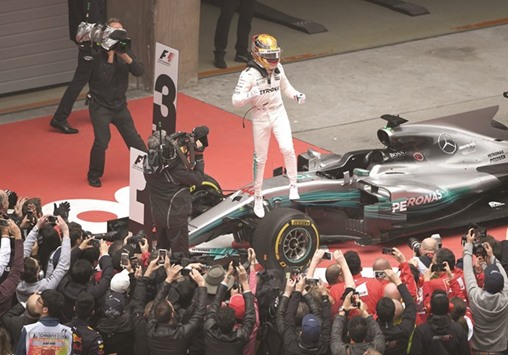 Mercedesu2019 British driver Lewis Hamilton celebrates after winning the Formula One Chinese Grand Prix yesterday.