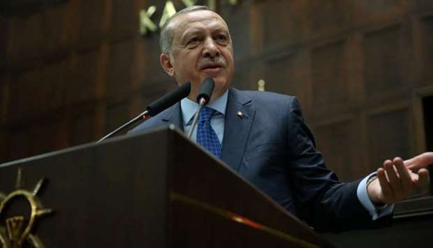 Turkish President Tayyip Erdogan speaks during a meeting of his ruling AK Party at the Parliament in Ankara