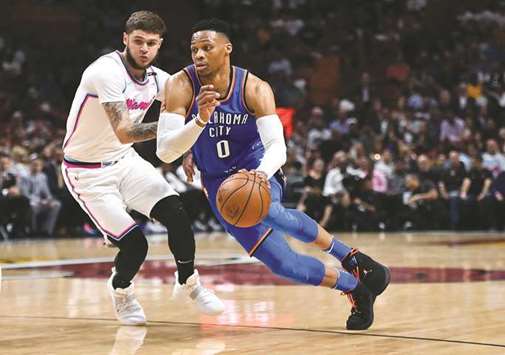 Oklahoma City Thunder guard Russell Westbrook (0) drives the ball around Miami Heat guard Goran Dragic (7) during the first half of their game on Monday. PICTURE: USA TODAY Sports
