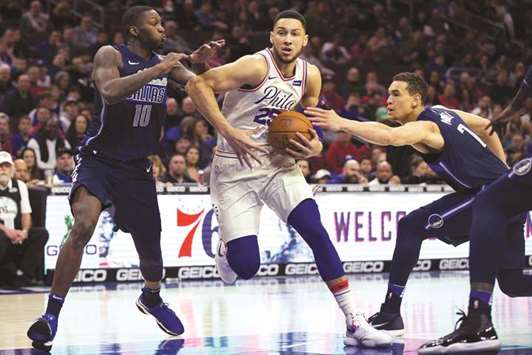 Philadelphia 76ers guard Ben Simmons (C).