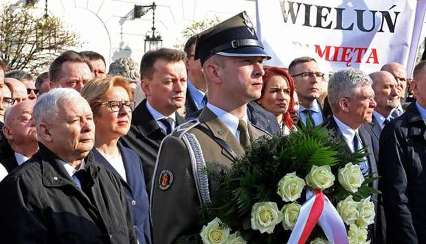 Leader of Polandu2019s governing PiS party Jaroslaw Kaczynski (L) attends a ceremony marking the eighth anniversary of the presidential plane crash in Smolensk that killed all 96 passengers, among them Lech Kaczynski and wife Maria in front of the presidential palace in Warsaw, Poland.
