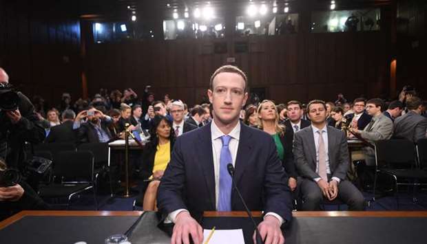 Facebook CEO Mark Zuckerberg arrives to testify before a joint hearing of the US Senate Commerce, Science and Transportation Committee and Senate Judiciary Committee on Capitol Hill