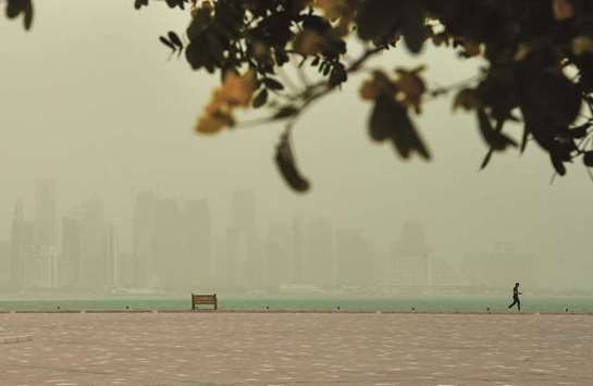 The West Bay skyline yesterday, shrouded in dust. PICTURE: Noushad Thekkayil