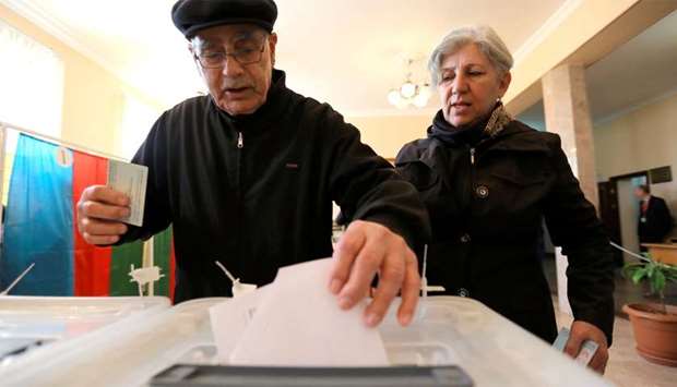 A man casts his vote during the presidential election in Baku, Azerbaijan