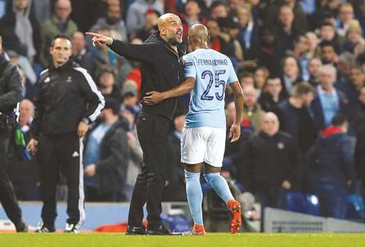 Manchester City manager Pep Guardiola remonstrates with referee Antonio Mateu Lahoz (not pictured) as he walks off at half time during the Champions League quarter-final second leg against Liverpool at Manchester, Britain. (Reuters)