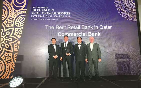 Dignitaries from Commercial Bank receiving the award during the International Excellence in Retail Financial Services 2018 Awards Ceremony held in Kuala Lumpur.