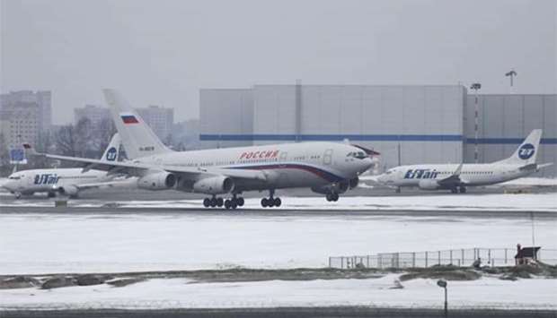 The Ilyushin Il-96 aircraft, transporting expelled Russian diplomats and their family members from the US, lands at Vnukovo airport outside Moscow on Sunday.