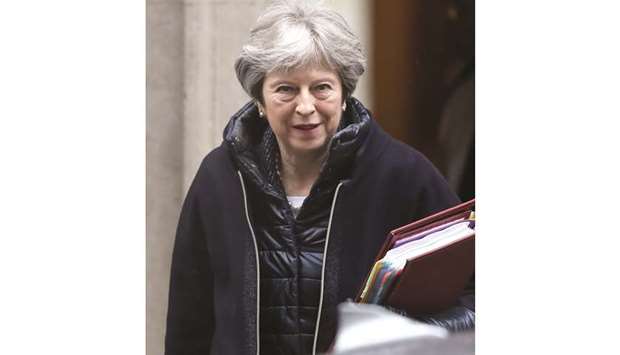 Theresa May, UK Prime Minister, departs number 10 Downing Street to attend a weekly questions and answers session in Parliament in London on March 28, 2018. Her Brexit priorities are to decide what the future relationship with Europe might look like, solve the intractable puzzle of the Irish border and see off an emboldened campaign for a second referendum.
