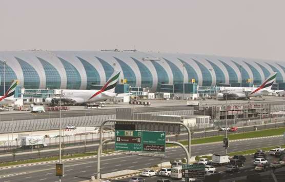 Airbus A380 planes owned by Emirates airlines in parking positions at Concourse A of Terminal 3 at Dubai International Airport (file). While the rising oil price is boosting Gulf economies and hence local demand for travel, a 25% gain over the past year presents a u201cchallengeu201d for Emirates, which does not hedge, according to its president Tim Clark.